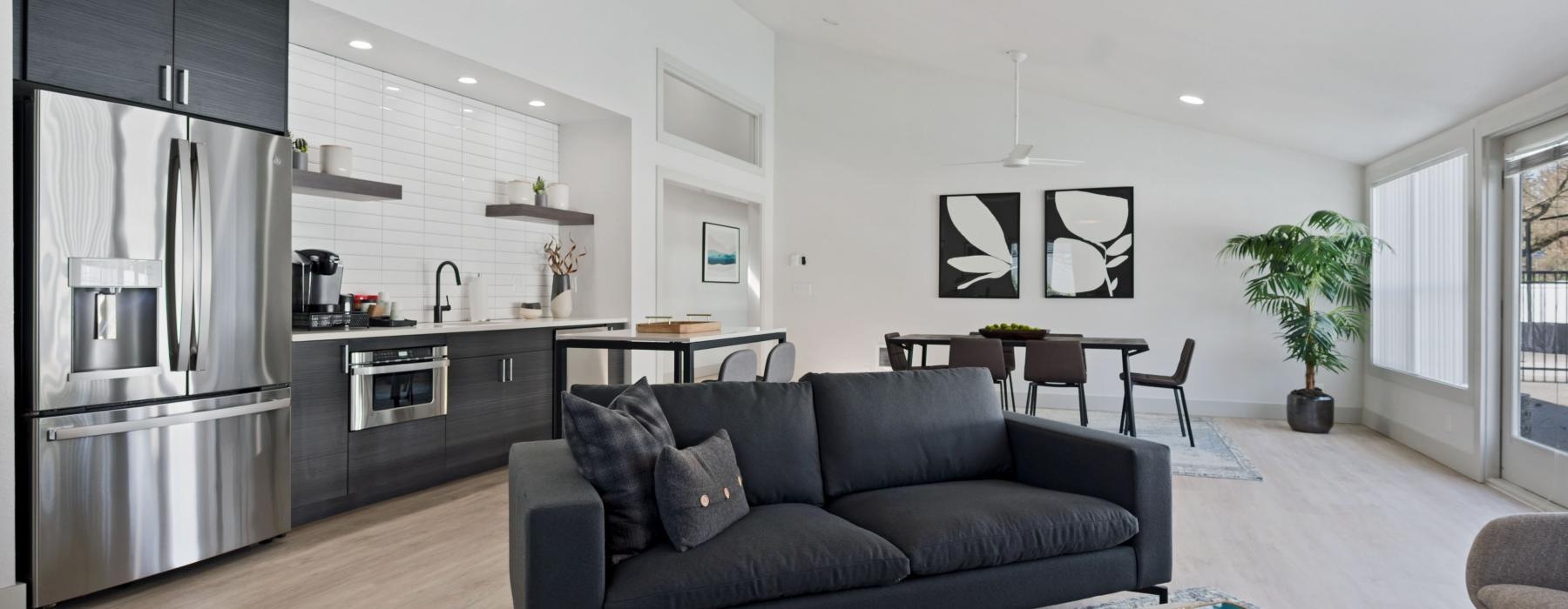a living room with a couch and a table