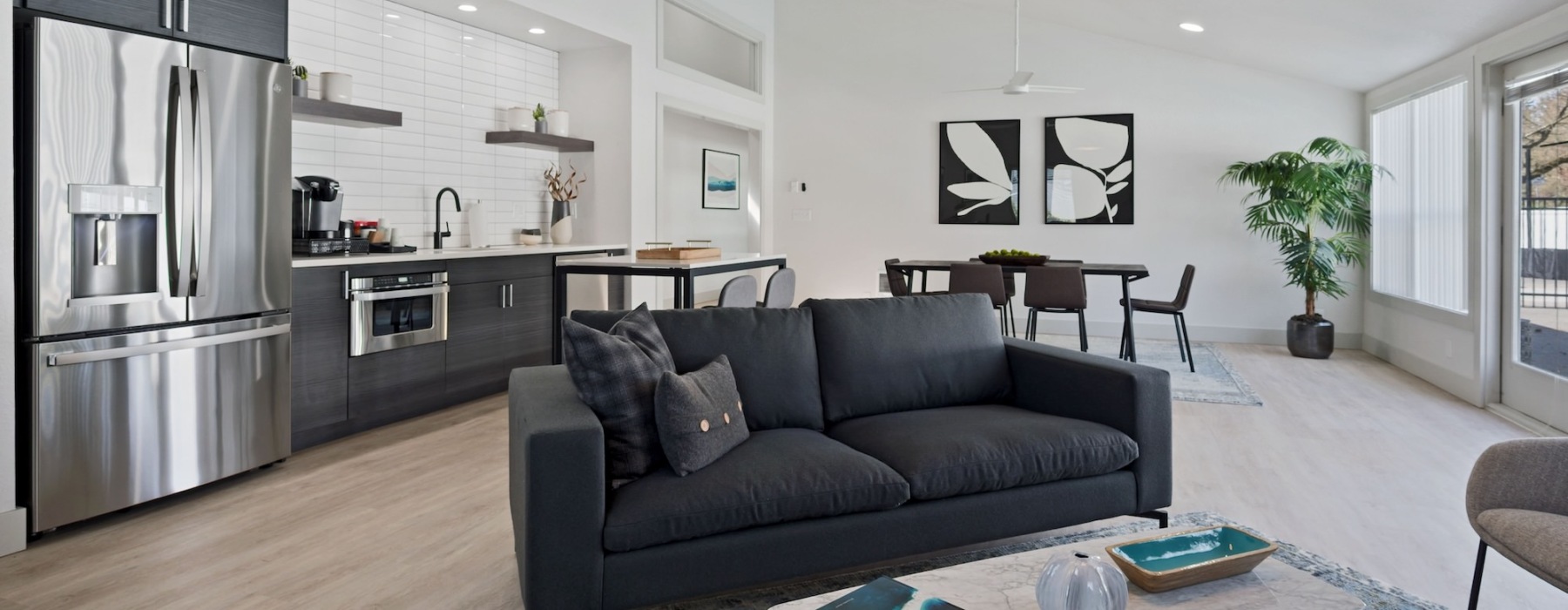 a living room with a couch and a table